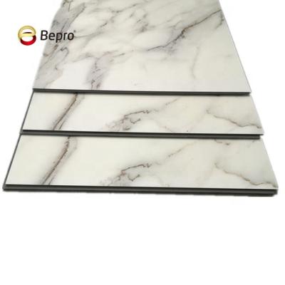 China Modern marble grain flooring click system spc plastic flooring for sale