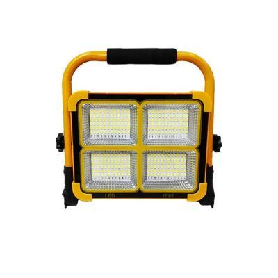 China Residential IP66 Portable and Rechargeable Solar Flood Light with USB Movable Multifunctional Emergency Lighting with Handheld Support for sale