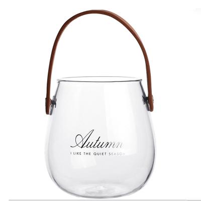 China Transparent Glass Handle Letter Series Europe Leather Strap Vase Glass Vase for sale