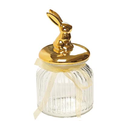 China Cover Nordic Gold Rabbit Jar Home Decoration Storage Sealed Glass Bottle for sale