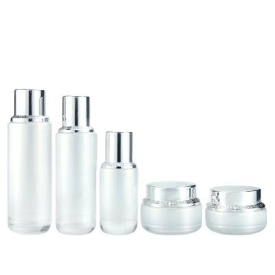 China Newest 100ml 120ml Personal Care Lotion Bottles Glass Bottle With Pump Luxury Glass Bottles for sale