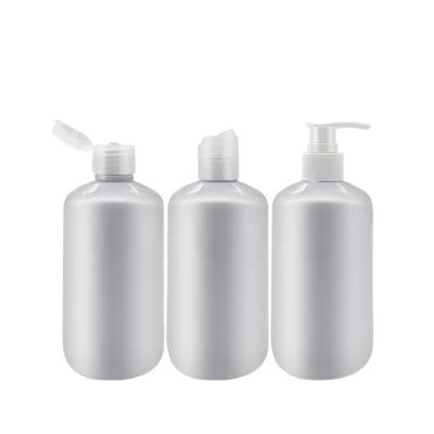 China BEAUTY PACKAGING 250ml 8oz Round Empty PET Bottle With Disc Cap And Pump Flip Lid Lotion Wholesale Portable Pump Cosmetic Packaging Supplier for sale