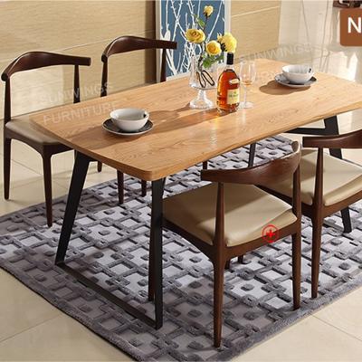 China Convertible MDF Top Dining Table Designs Wrought Iron Dining Table Base for sale