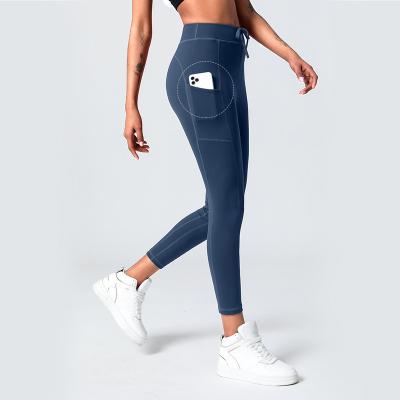 China Hot Selling Comfortable Fitness Yoga Pants Breathable Shaping Active Wear Gaiters With Pockets For Women for sale