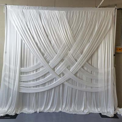 China Wedding Stage Decoration Wedding Supply Backdrop White Double To Drape White Fabric Curtains Cross Drapery To Wedding Hall Backdrop Decorative for sale