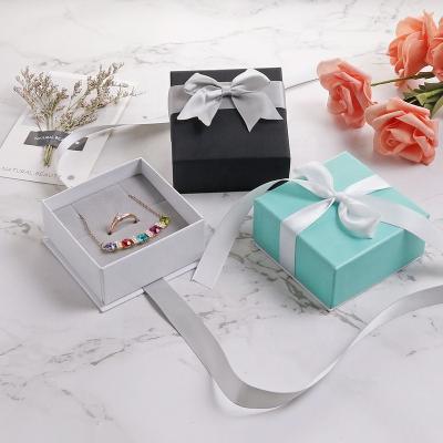 China Custom Logo Luxury Butterfly Paper Necklace Ribbon Jewelry Packaging Box Recyclable for sale