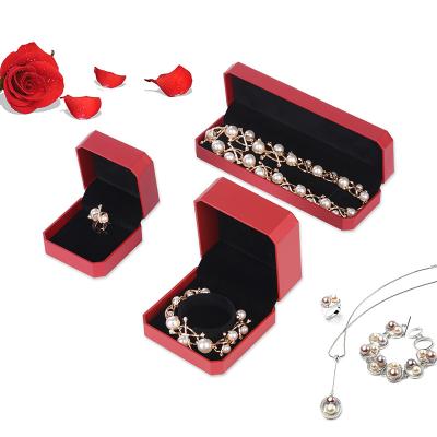 China Hot Selling Plastic Jewerly Packaging Case Custom Logo Ring Necklace Earring Bracelet Jewelry Box for sale