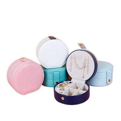 China Leather Women Make Up Earrings Necklace Organizer Portable Jewelry Storage PU Leather Round Travel Jewelry Boxes for sale