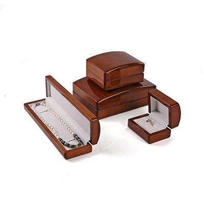 China Modern Elegant Custom Logo Printed Wooden Jewelry Necklace Ring Earring Storage Packaging Jewelry Box for sale