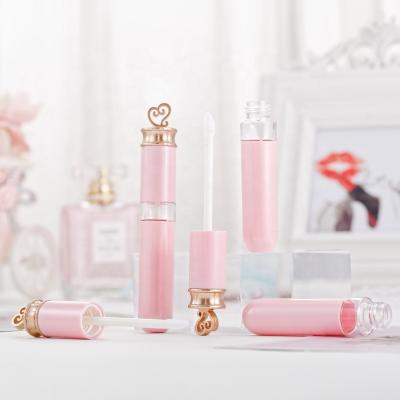 China Hot Selling Cosmetics Lip Gloss Tube Packaging Container Top Empty Bottle Cap Lip Gloss Heart Shaped Pink Tubes for sale