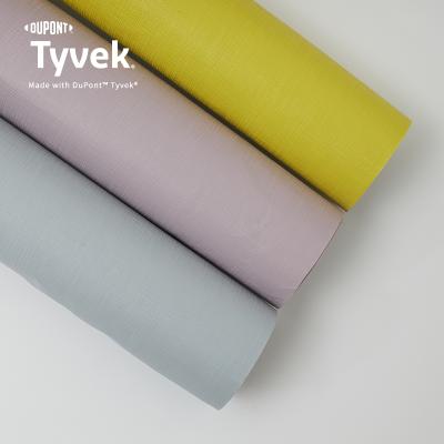 China Grid Pattern Waterproof Environmental PU Coated Tyvek Fabric 1443R for sale