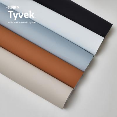 China Waterproof Customized Color Matte Environmental PU Coated Tyvek Fabric 1443R for sale