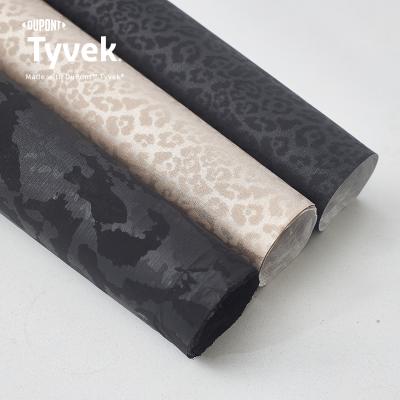 China Waterproof Customized 1443R Pattern Colored Tyvek Fabric Roll for sale