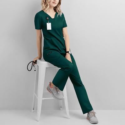 China Moisture Absorption/Short Sleeve Coveralls New Dark Green High End Dental Doctor Scrubs Uniforms Operating Room Beauty Salon Nurse Clothes for sale