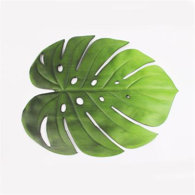 China Table Accessories Sustainable Eva Green Monstera Leaf Nordic Natural Wedding Place Mats for sale