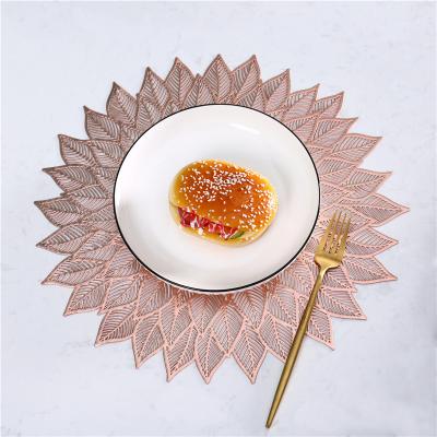 China Sustainable Unique Luxurious Christmas Table Dining Gold Printed Round Flower PVC Place Mats for sale