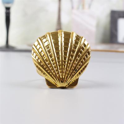 China New bulk natural clear modern brass napkin rings brass napkin rings stocked gold shell and silver table decoration sea oyster for sale