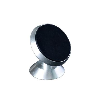 China New Universal 360 Rotating Magnetic Metal Magnet Car Cell Phone Holder Adjustable Mobile Phone Holder for sale