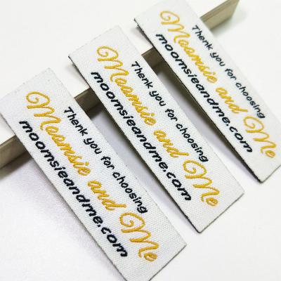 China Viable Wholesale Clothes Stickers Iron On Custom Logo Woven Label Serial Numbers For Apparel for sale