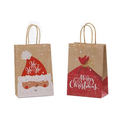 China Bolsas de presente de papel de Natal Bolsas de compras de papel Kraft reutilizáveis Logotipo impresso à venda