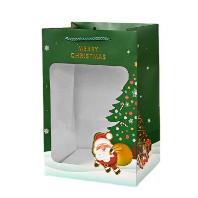 China Custom Order Accepted Eco Friendly Paper Christmas Present Bag with Clear PVC Window for sale