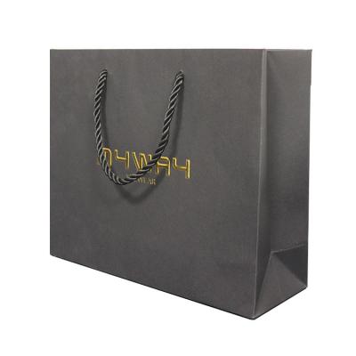 China Hot Stamping Paper Gift Bags Clothing Shoes Gift Packaging Bag For Retail Store for sale