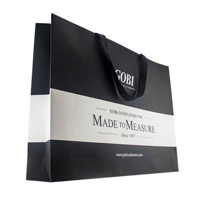 China Custom Printed Shopping Paper Bag Hot Stamping Luxury Shopping Paper Bag for sale