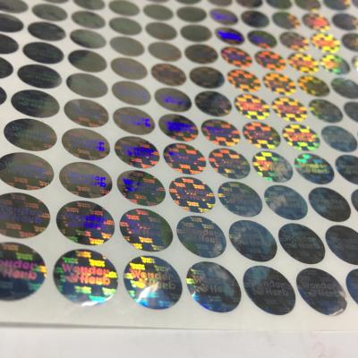 China Printable Hologram Adhesive Sticker Label Waterproof Laser Sticker Paper For Packaging for sale