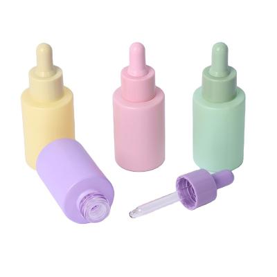 China Cosmetic Factory 30ml matte colorful cosmetic glass serum 1oz oil dropper bottle cosmetics packaging containers bottles for sale