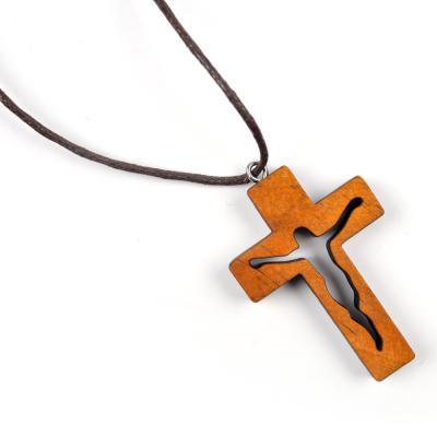 China Lastest Prayer Solid Wood Jesus Cross Necklace Christian Catholic Pendant Durable Wooden Cross Pendant Necklace for sale