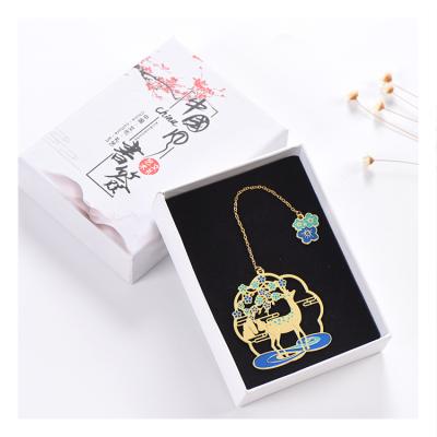 China Durable Promotional Custom Metal Bookmark Creative Pattern Metal Bookmark With Small Tassel Pendant for sale