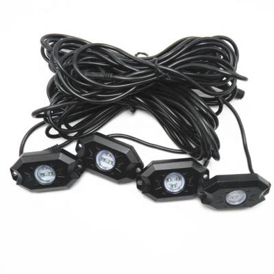 China Iron & Zinc Alloy 12V 24V RGB LED Auto Lighting System Lighting APP Control 4 Pods RGB LED Rock Light For Car Trucks for sale