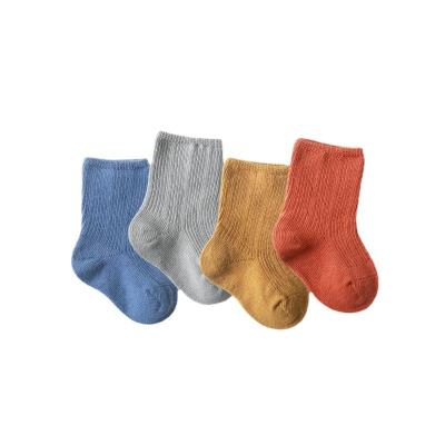 China Wholesale QUICK DRY boys and girls spring and summer new style pure color in tube socks three pairs of cotton children baby socks for sale