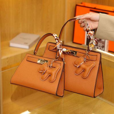 China Others Wholesale Ladies Hanging PU Leather Tote Bag Ornament Tote Bag Brand Luxury Fashion for sale