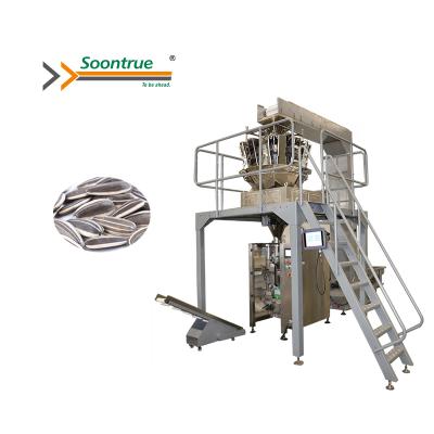 China Multifunctional Automatic Roasted Food Peanut/Cashew Weighing And Vertical Packaging Machine for sale