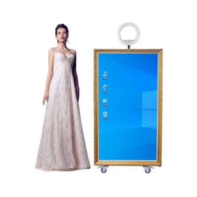 China Portable Photo Booth SDK 65 Inch Selfie Photobooth Commercial Rental Magic Mirror For Wedding Party Mirror Photo Booth With Camera for sale