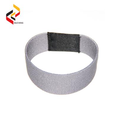 China Festival Waterproof Elastic Reusable NFC Wristband / Waterproof RFID Fabric Wristbands RFID Stretch Woven Wristband for sale