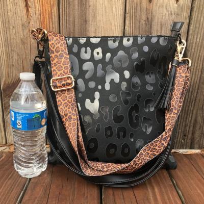 China Newspaper Used New Western Black Leopard Cheetah Cell Phone Cross - Body Bag Purse With Two Adjustable Strap And Key Chain Tassel for sale