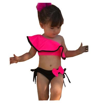 China 100% Slant Shoulder Candy Color Bow Design Baby Slit Swimwear Ruffled Summer Cute Kids Swimming Ruffled Children's Swimwear for sale