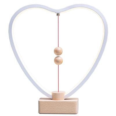 China Creative Magnetic Led Bedside Night Lamp USB Bedside Decorative Light Switch Heart Shaped Balance Light Switch Decoration Bedroom for sale