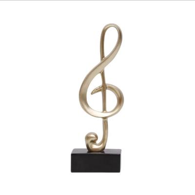 China Handmade Crafted Antique Craft Gift Piano Room Decoration Resin Musical Note Trophy Ornament Home Decor Accessories for sale