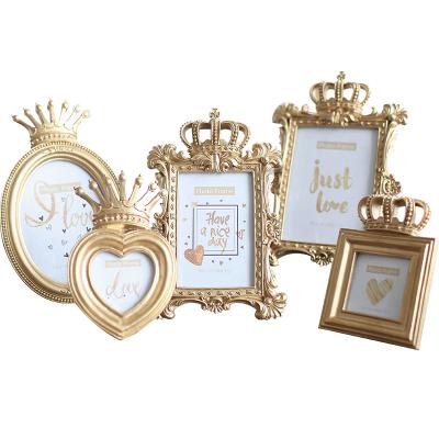 China Home decoration/gold crown photo frame love gold gift position custom decorative resin picture frame for sale