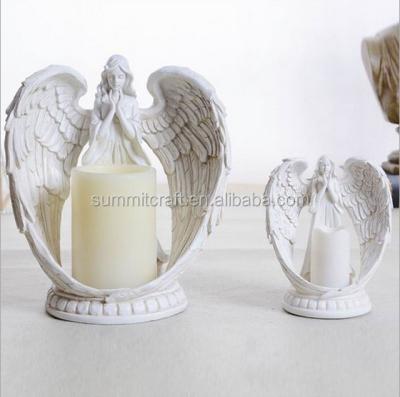 China Handwork Resin Praying LED Candle for sale