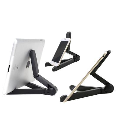 China Multifunctional Adjustable Portable and Foldable V Shape Mobile Phone Holder for iPad Grip Stand for sale