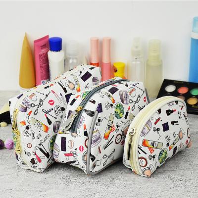 China Fashion Cute Digital Printing PU Leather Cosmetic Bag Geometric Shape Rectangle Cosmetic Bag With Zipper for sale