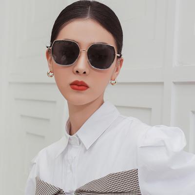 China Fashion Sunglasses Amazon Hotsale Hollow Polarized Metal Frame Sunglasses For Women Ladies for sale