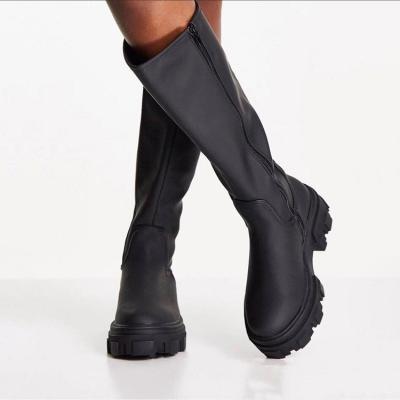 China 2021 Autumn And Winter New Large Size Fashion Waterproof Boots Around Toe Solid Color Mid-heel Mid-heel Zipper Martin Boots Women for sale