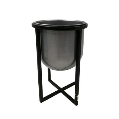 China Modern minimalist luxury home decorative cup shape metal flower pot with stand for sale