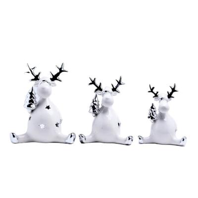 China New Arrivals Modern Christmas Decoration Supplies Cute Ceramic Reindeer Table Top Ornament for sale