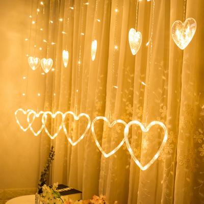 China Colorful Wedding LED String Window Light Christmas Waterfall Heart Shape Merry Christmas Light Curtain Light for sale